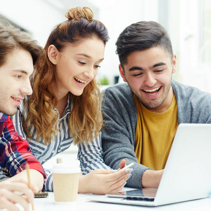 Happy learners video chatting with friends online